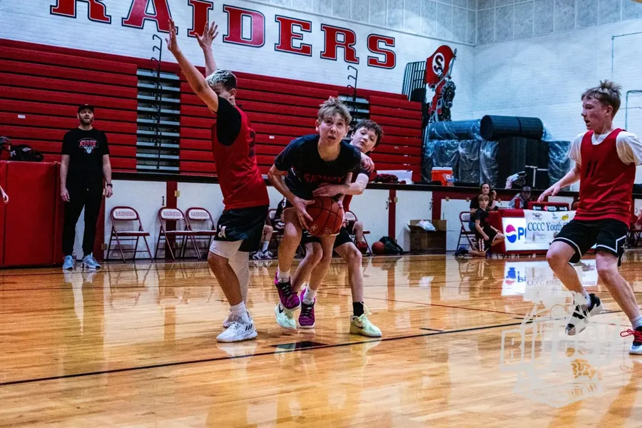 Youth basketball players competing in the gym at The Center during the Youth Basketball Classic